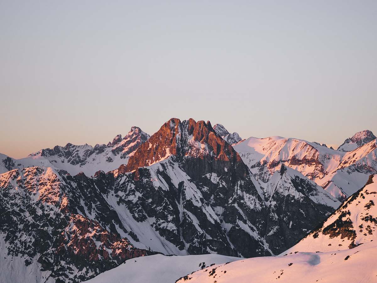 mountain range view of snow capped mountain nebelhorn